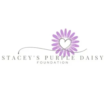 Stacey's Purple Daisy Foundation logo featuring a stylized purple daisy with a white heart in the center, above the text 'STACEY'S PURPLE DAISY FOUNDATION' on a white background.